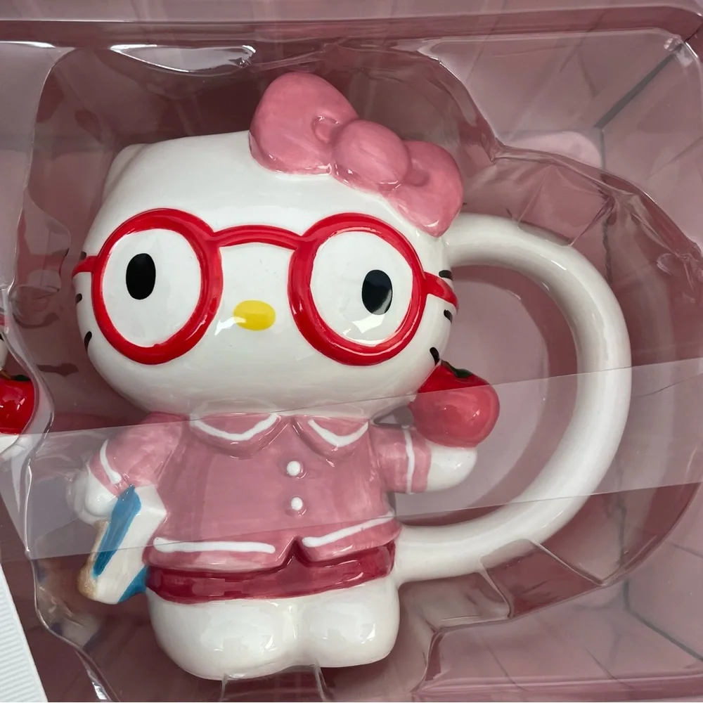 NIB hello kitty mug and figurine set